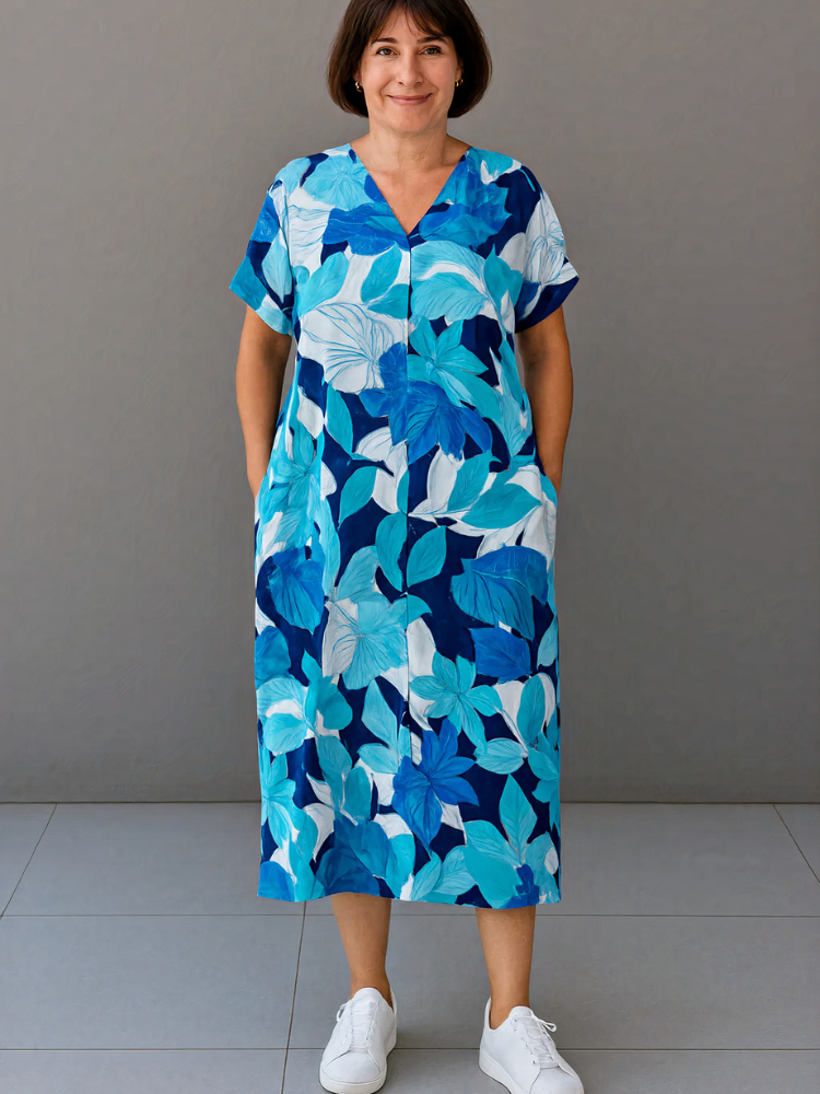 Damen lebendiges luftiges Sommerkleid mit schwungvollem Schnitt, ideal für sommerliche Outfits und fröhliche Anlässe.