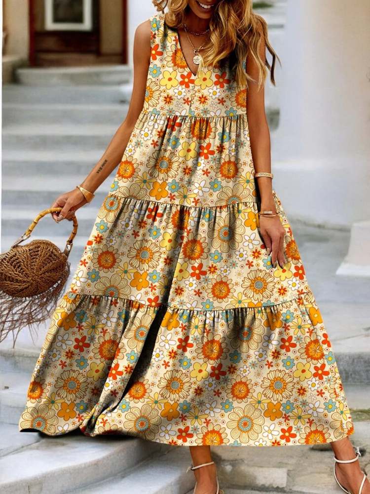 Buntes geblümtes Damenkleid mit V-Ausschnitt und Stufenoptik für den Sommer