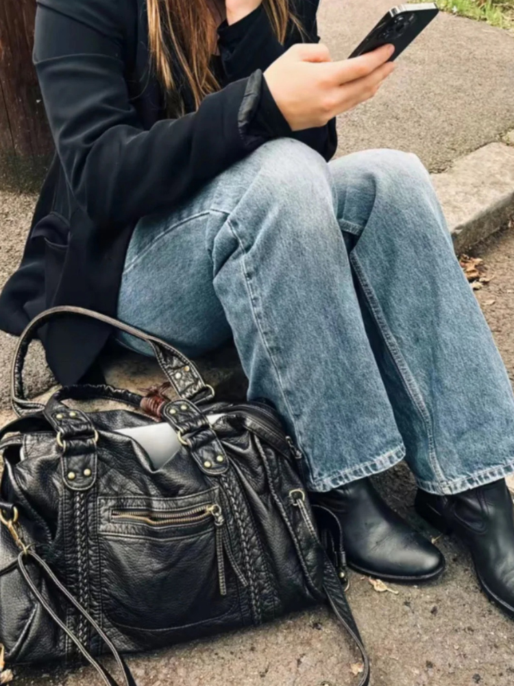 Damen elegante schwarze Umhängetasche – stilvolle Alltagstasche mit funktionalem Design.
