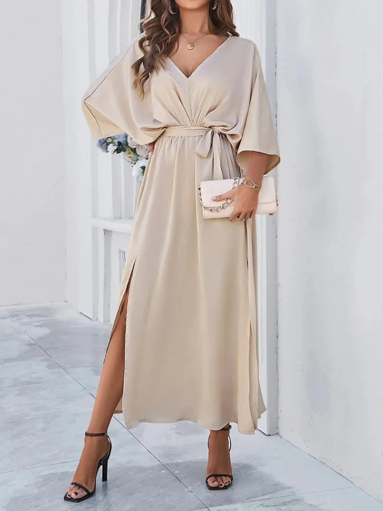  Damen elegantes Sommerkleid mit V-Ausschnitt und figurbetontem Schnitt, ideal für stilvolle Sommerlooks und verschiedene Anlässe.

