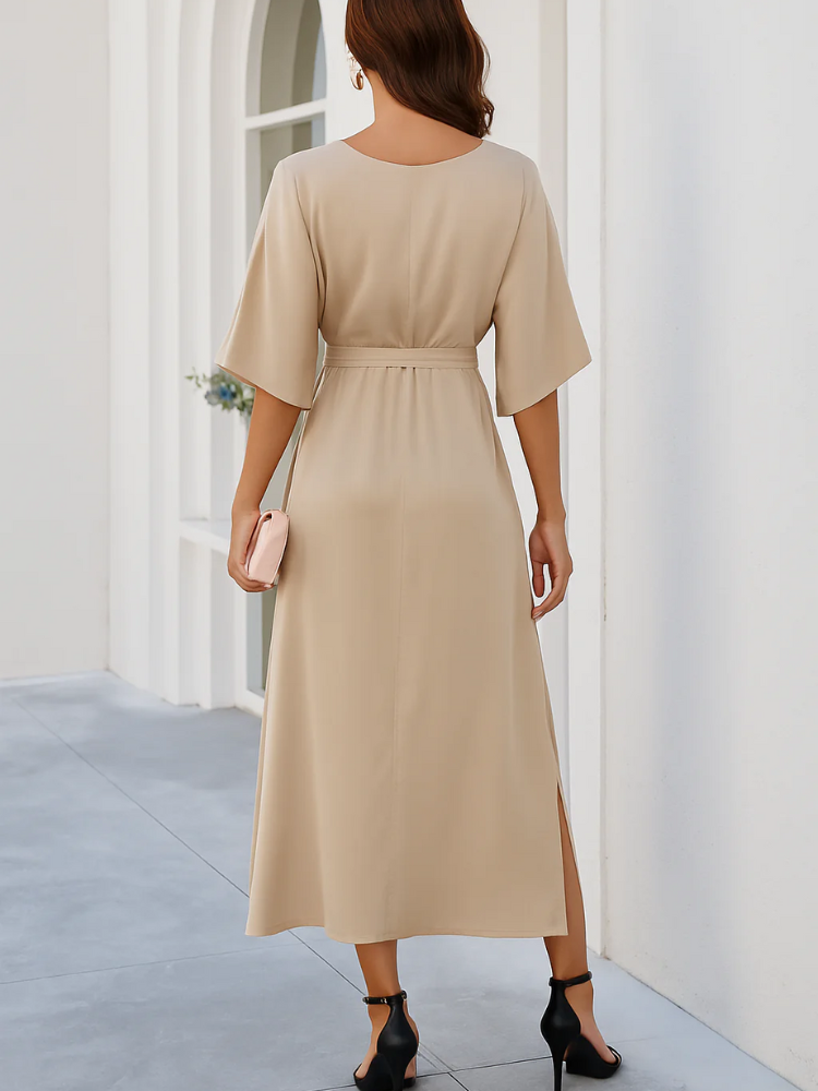  Damen elegantes Sommerkleid mit V-Ausschnitt und figurbetontem Schnitt, ideal für stilvolle Sommerlooks und verschiedene Anlässe.

