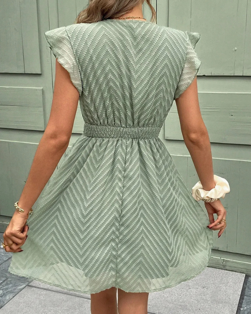  Damen fließendes Sommerkleid in lockerer Passform, ideal für sonnige Tage und sommerliche Anlässe.

