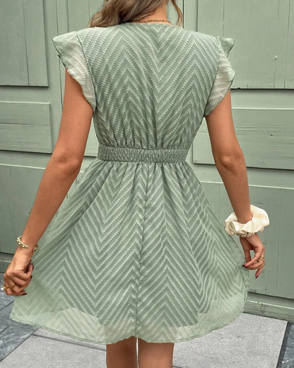  Damen fließendes Sommerkleid in lockerer Passform, ideal für sonnige Tage und sommerliche Anlässe.

