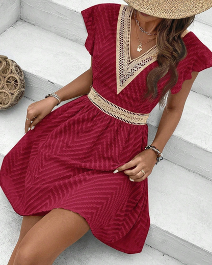  Damen fließendes Sommerkleid in lockerer Passform, ideal für sonnige Tage und sommerliche Anlässe.

