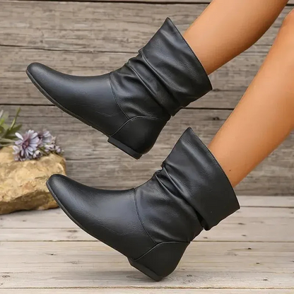 Damen Klassische Stiefeletten in elegantem Design, vielseitig kombinierbar für Alltag und besondere Anlässe.
