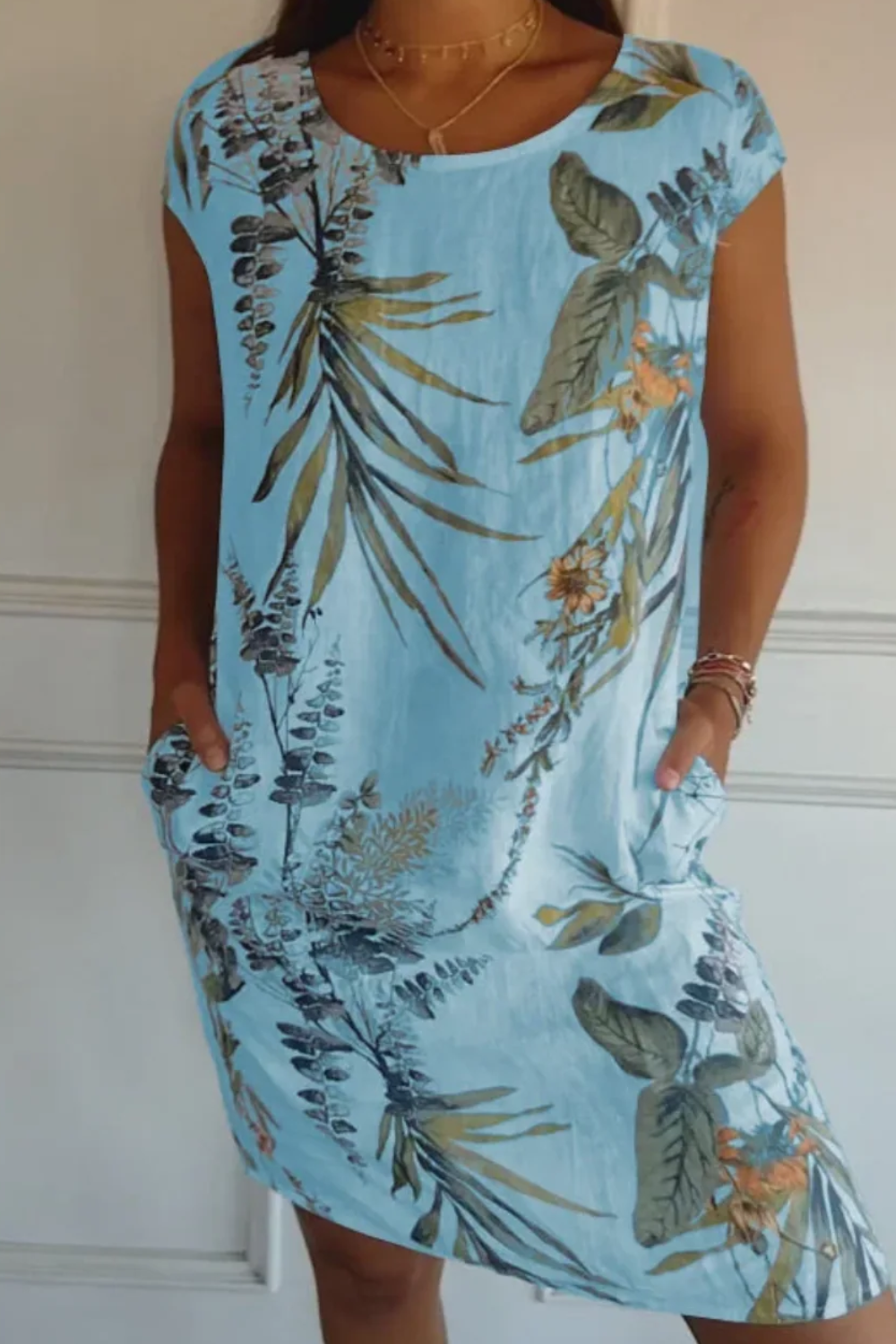  Damen lässiges geblümtes Kleid mit lockerer Passform und Taschen, ideal für sommerliche und entspannte Alltags-Outfits.

