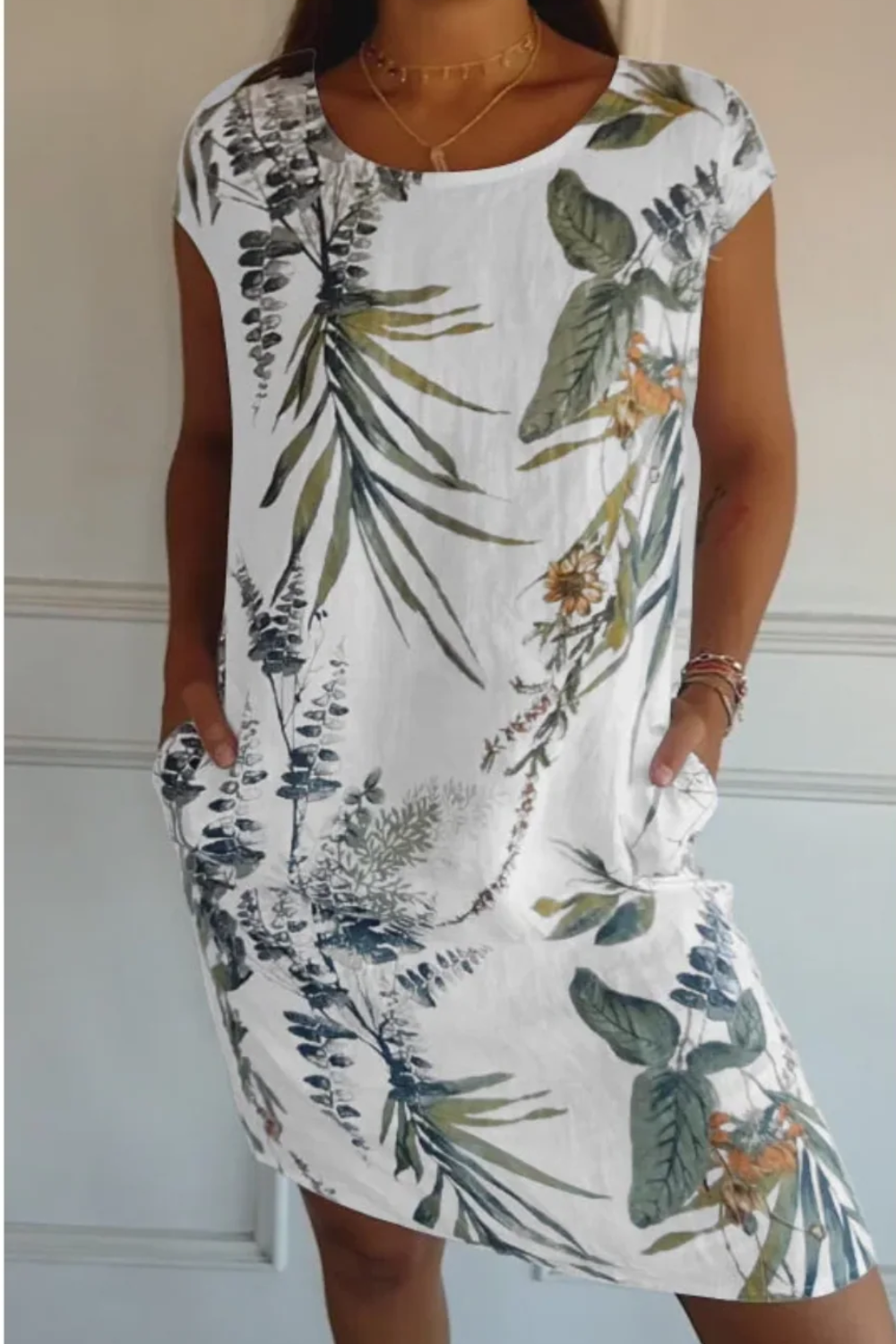  Damen lässiges geblümtes Kleid mit lockerer Passform und Taschen, ideal für sommerliche und entspannte Alltags-Outfits.

