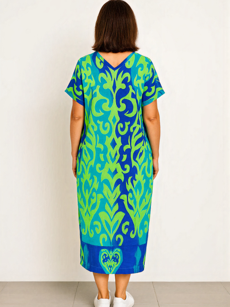 Damen lebendiges luftiges Sommerkleid mit schwungvollem Schnitt, ideal für sommerliche Outfits und fröhliche Anlässe.