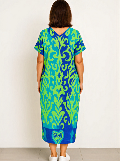 Damen lebendiges luftiges Sommerkleid mit schwungvollem Schnitt, ideal für sommerliche Outfits und fröhliche Anlässe.