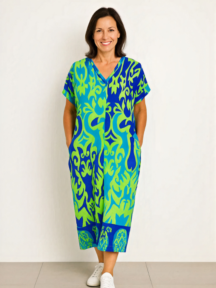 Damen lebendiges luftiges Sommerkleid mit schwungvollem Schnitt, ideal für sommerliche Outfits und fröhliche Anlässe.