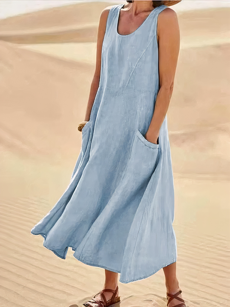 Damen luftiges Sommerkleid mit Taschen in modernem Design, ideal für warme Tage und vielseitige Sommerlooks.

