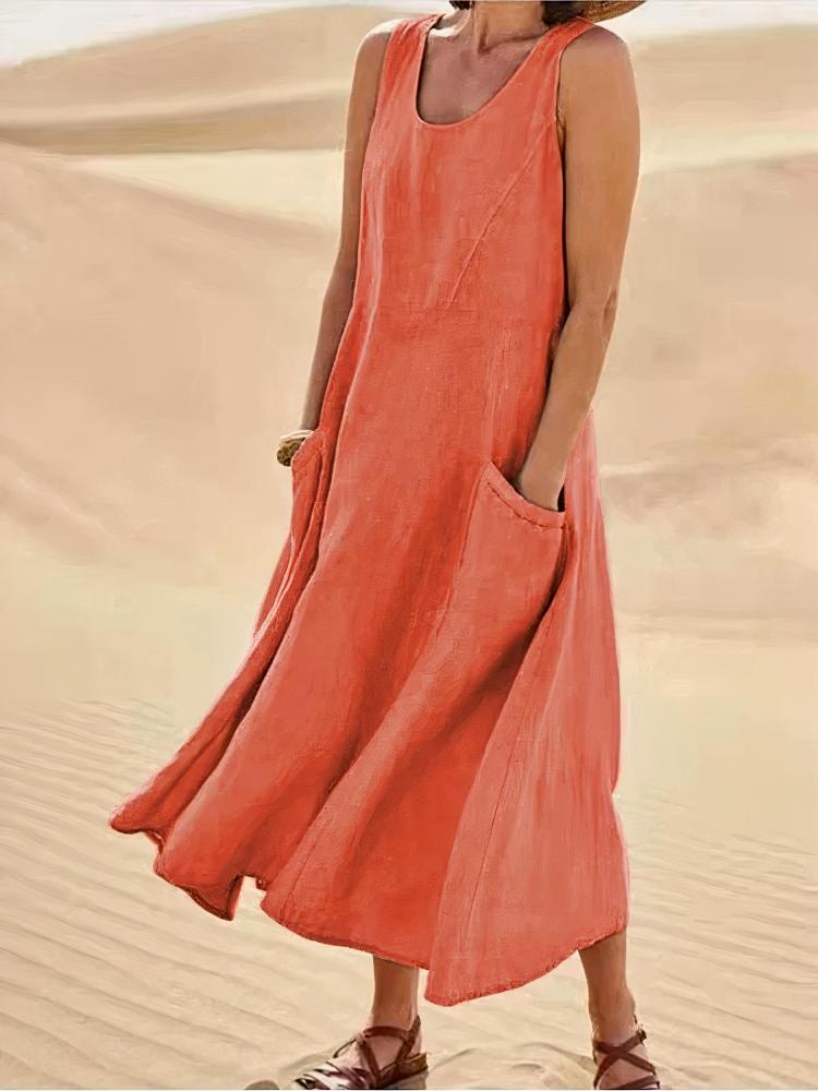 Damen luftiges Sommerkleid mit Taschen in modernem Design, ideal für warme Tage und vielseitige Sommerlooks.

