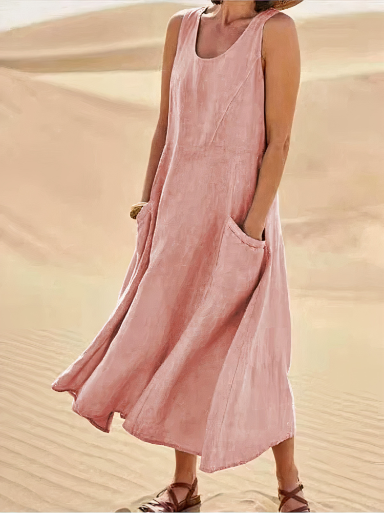 Damen luftiges Sommerkleid mit Taschen in modernem Design, ideal für warme Tage und vielseitige Sommerlooks.

