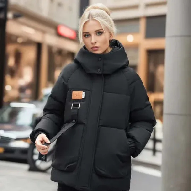 Damen luxuriöse Daunenjacke in elegantem Design, ideal für kalte Tage.
