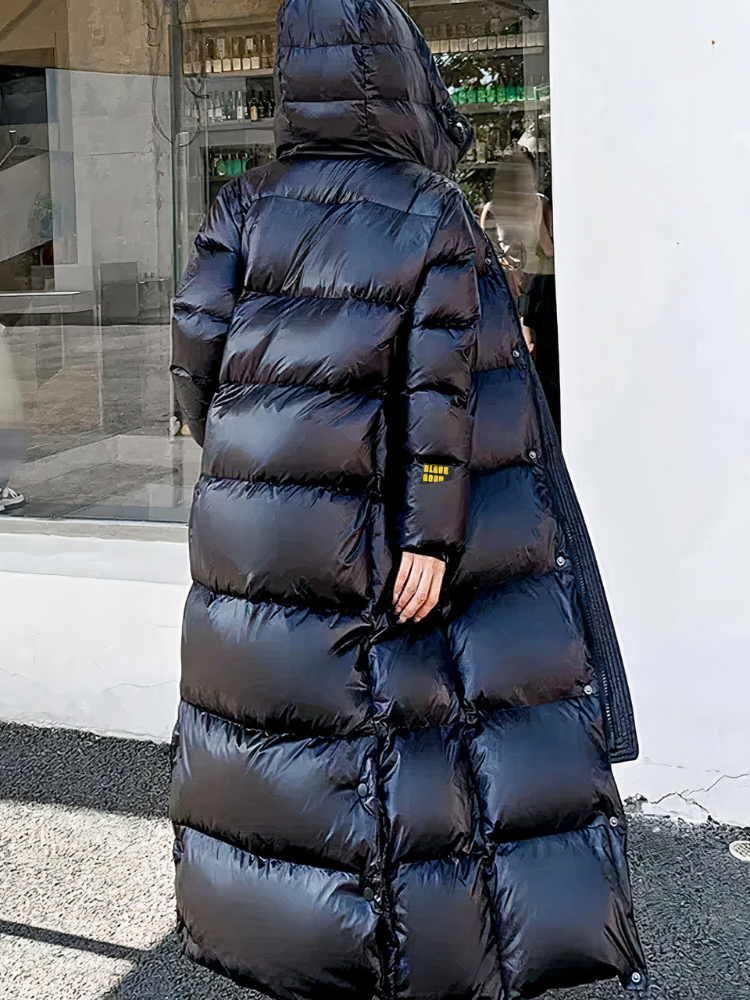 Damen schwarze gesteppte Winterjacke, stilvoller und warmer Begleiter für den Winter