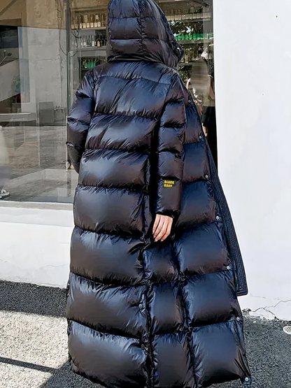 Damen schwarze gesteppte Winterjacke, stilvoller und warmer Begleiter für den Winter