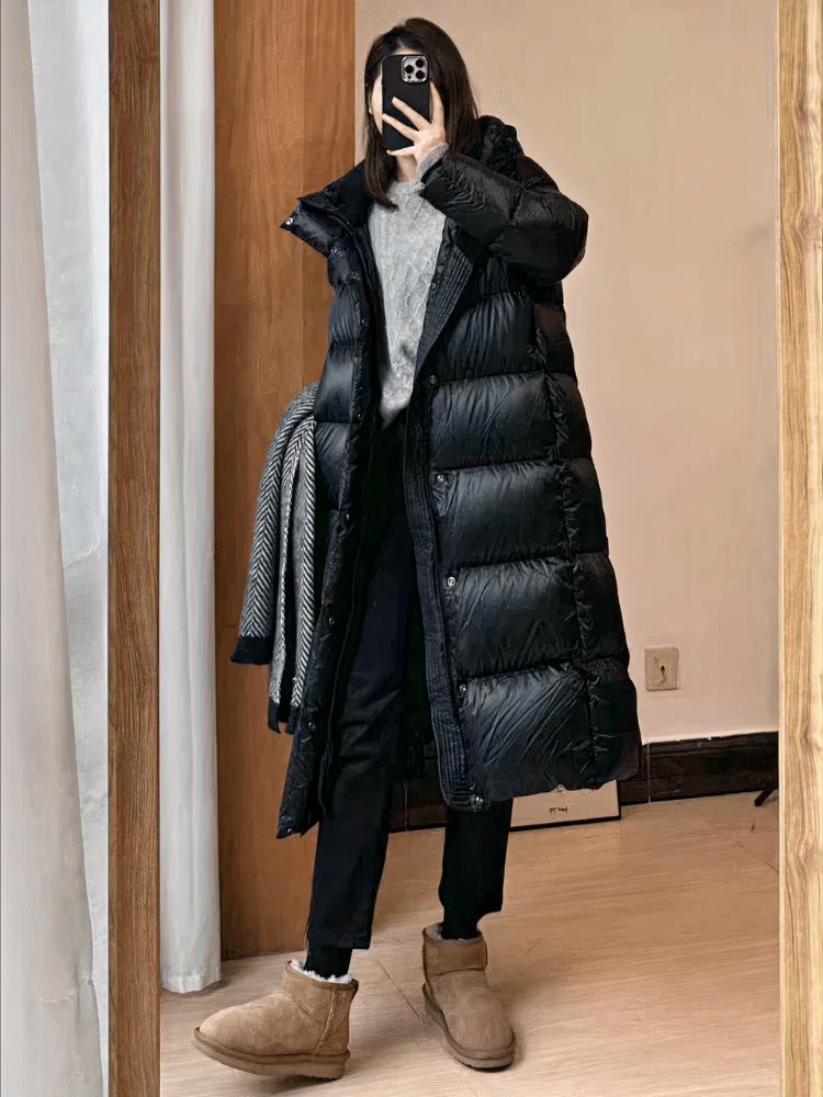 Damen schwarze gesteppte Winterjacke, stilvoller und warmer Begleiter für den Winter