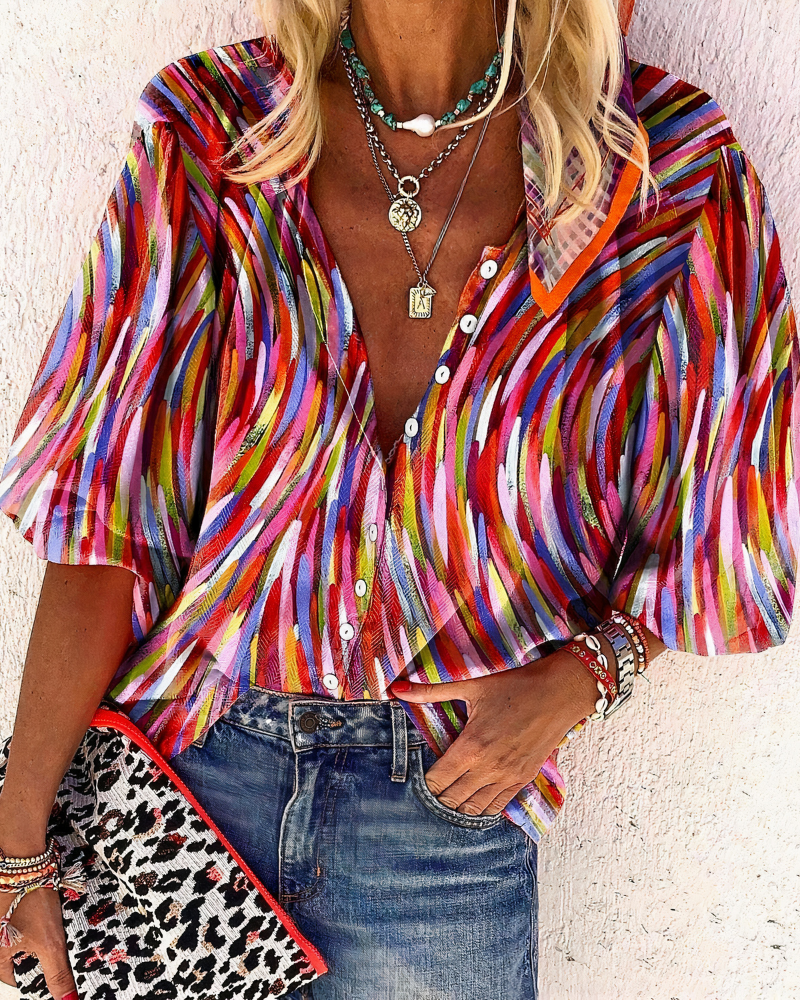 Damen Vintage bunte Bluse mit farbenfrohem Muster und lockerer Passform, ideal für sommerliche Outfits.