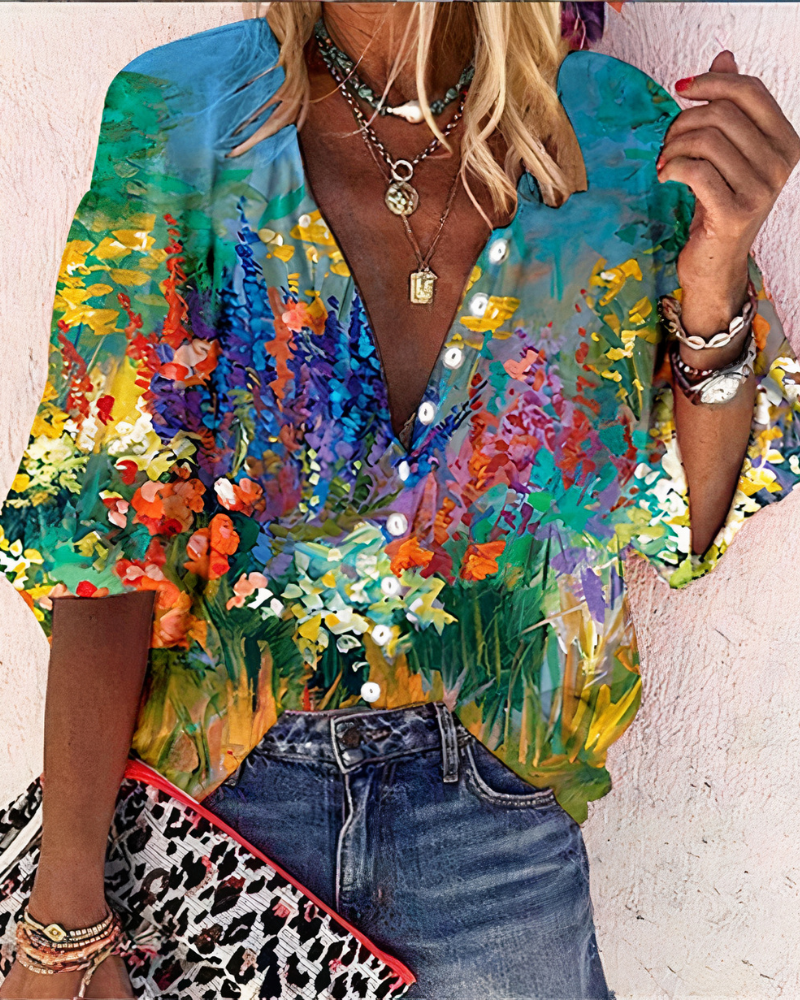 Damen Vintage bunte Bluse mit farbenfrohem Muster und lockerer Passform, ideal für sommerliche Outfits.