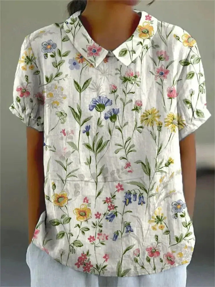 Damen Vintage geblümte Sommerbluse kurzarm für femininen Sommerlook









