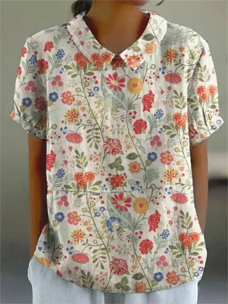 Damen Vintage geblümte Sommerbluse kurzarm für femininen Sommerlook










