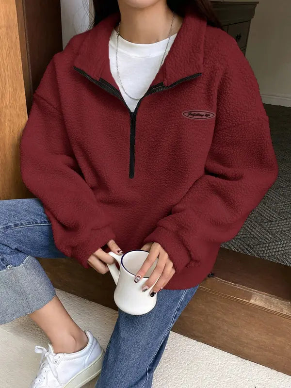 Lässiges Sweatshirt mit Half-Zip und Patch-Detail für Damen | Elvara
