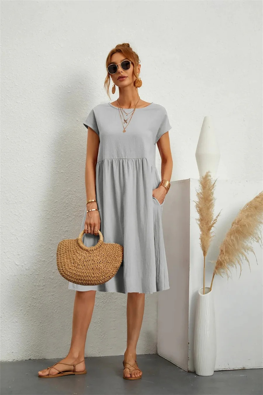 Elegantes Damen Sommerkleid mit Tasche für feminine und vielseitige Sommer-Looks