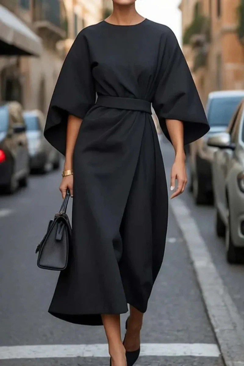 Elegantes Vintage-Kleid für Damen mit klassischem Schnitt, ideal für festliche Anlässe und stilvolle Alltagslooks.

