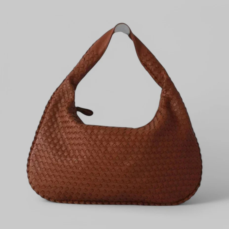 Geräumige Damenhandtasche mit strukturiertem Innenraum und stilvollem Design für den Alltag.
