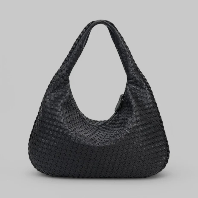 Geräumige Damenhandtasche mit strukturiertem Innenraum und stilvollem Design für den Alltag.
