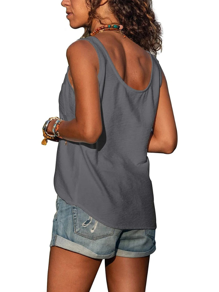  Lässiges ärmelloses Damen-Tanktop mit lockerem Schnitt, ideal für sommerliche Outfits und sportliche Aktivitäten.