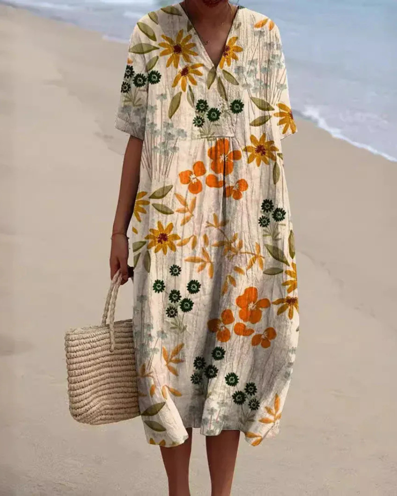 Lockeres geblümtes Sommerkleid für Damen mit bequemer Passform, ideal für warme Tage und sommerliche Anlässe.

