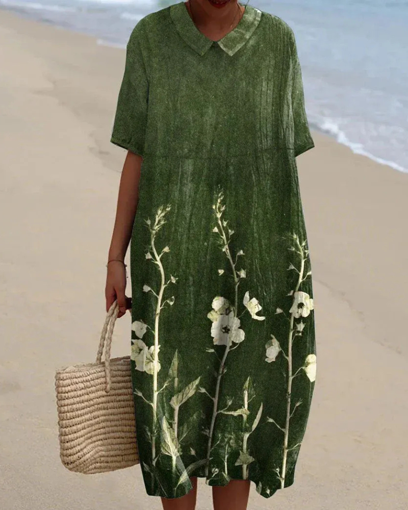 Lockeres geblümtes Sommerkleid für Damen mit bequemer Passform, ideal für warme Tage und sommerliche Anlässe.

