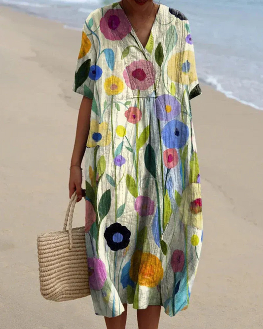 Lockeres geblümtes Sommerkleid für Damen mit bequemer Passform, ideal für warme Tage und sommerliche Anlässe.

