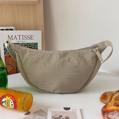 Trendige Halbmond-Crossbody-Tasche für Damen mit modernem Design und praktischem Reißverschluss