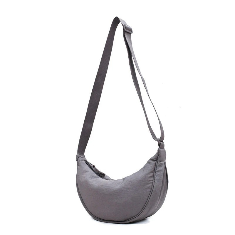 Trendige Halbmond-Crossbody-Tasche für Damen mit modernem Design und praktischem Reißverschluss