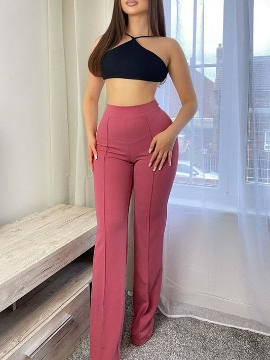 Trendige Schlaghosen für Damen mit weitem Bein und stilvollem Retro-Look, vielseitig kombinierbar für verschiedene Anlässe.

